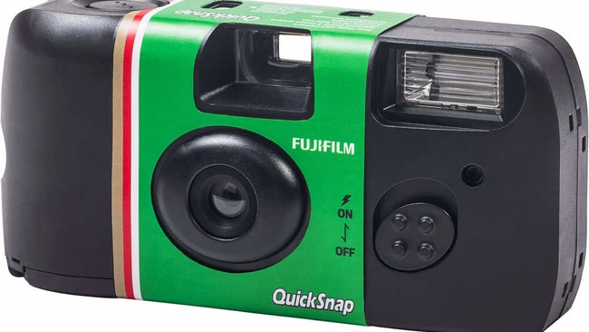 Fujifilm QuickSnap single-use film camera with green and black body