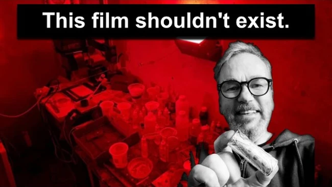 Graphic design with man in glasses against red background with text overlay