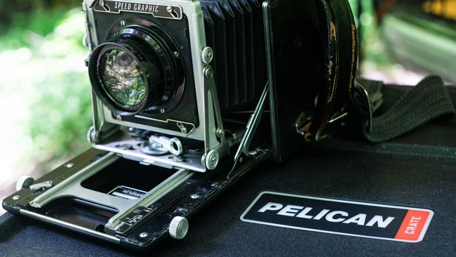 Vintage Graflex Pacemaker camera with Pelican case and branding visible