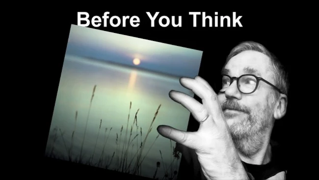 Graphic showing man with glasses holding photograph of sunset landscape with text 'Before You Think'