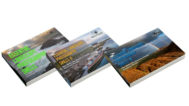 Three photography instructional books displayed at an angle showing landscape and outdoor photography guides
