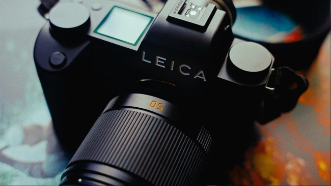 Leica rangefinder camera with standard lens mounted, viewed from above