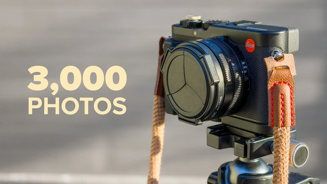 Large format camera mounted on tripod with text overlay reading '3,000 PHOTOS'