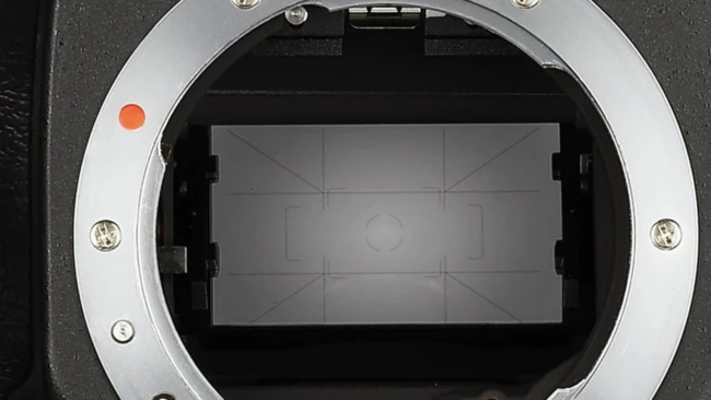 Camera mirror and focusing screen viewed from the mirror box during sensor inspection