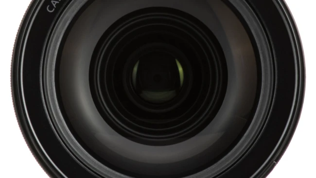 Front view of a camera lens with multiple glass elements visible through the barrel