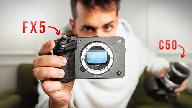 Man in white hoodie holds up a Sony full-frame camera body labeled FX5, with a camera labeled C50 at right.