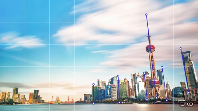 Shanghai Pudong skyline with the Oriental Pearl Tower, overlaid with blue perspective correction guide lines and anchor points