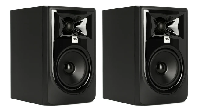 Pair of black JBL studio monitor speakers with glossy front panels, tweeters, and woofers on a white background