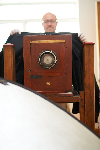 Patrick Andrade of Relic Fine Art Photography prepares to take a portrait