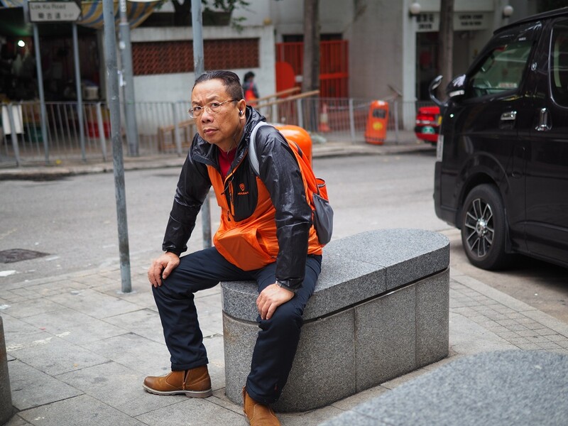 orange man hong kong street photography