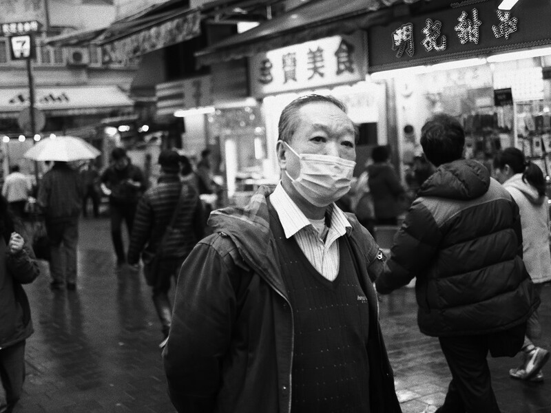 chinese man mask hong kong street photography