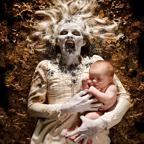 Witch Holding a Sleeping Baby