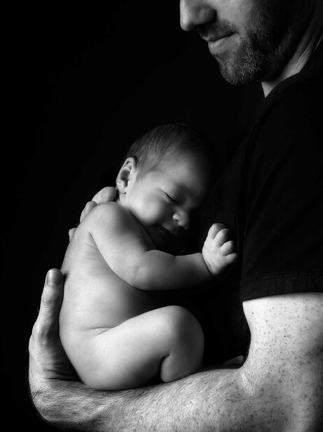 newborn baby with father