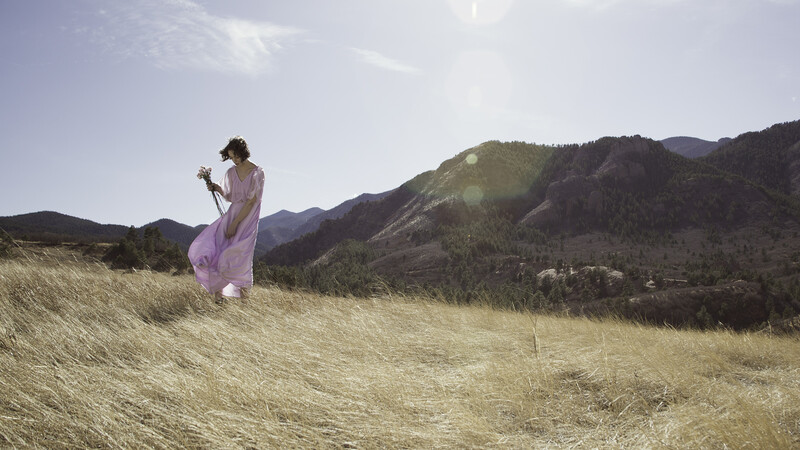 Environmental portrait in the high plains at the foot of the Colorado Rockies
