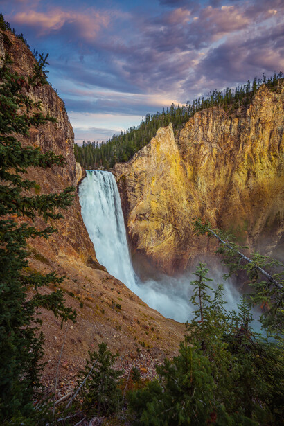 sunrise shot of lower falls in yellowstone national park