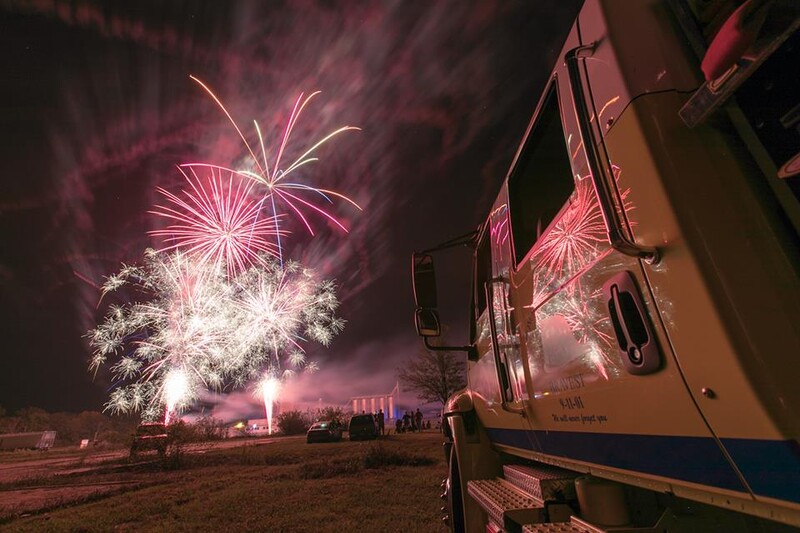 Photo By Andy Grimm, Fireworks in front of the Madison Fire and EMS vehicle