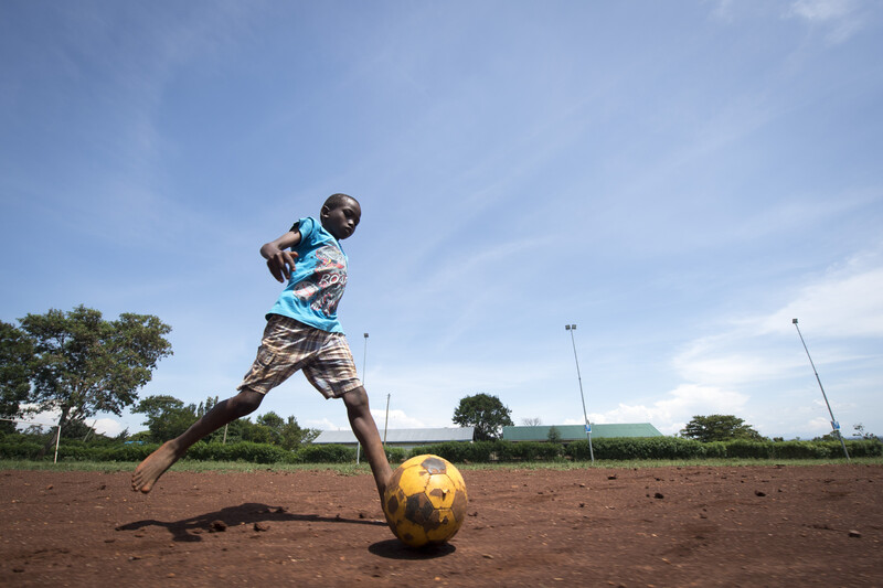 Boy playing soccer