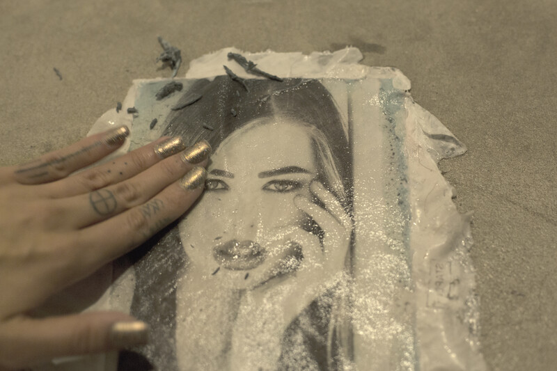 Carefully rub off the paper from the back of your image