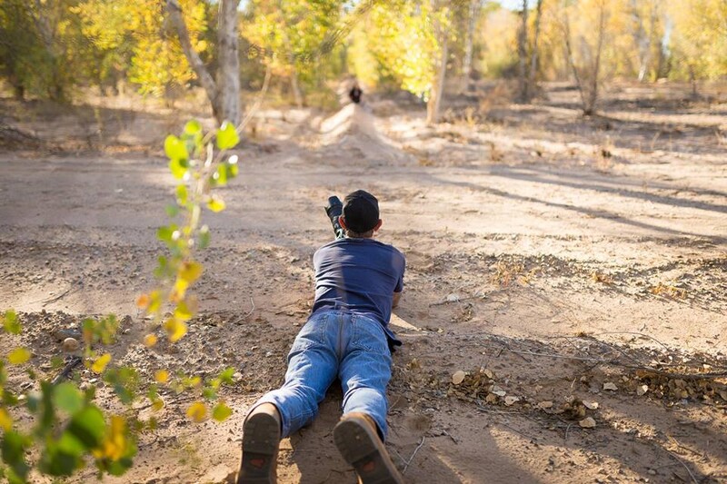 Writer Jason Vinson in the fetal position to get the perfect shot 