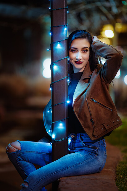 portrait of a girl at night with found light