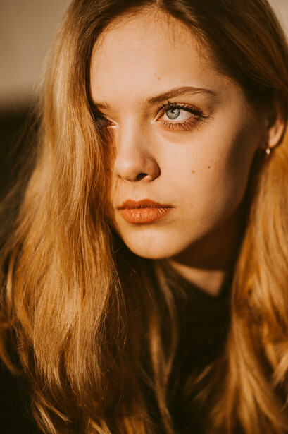 Close-up of a young blond woman.
