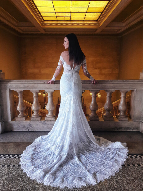 Bride with a wedding dress in a manor.