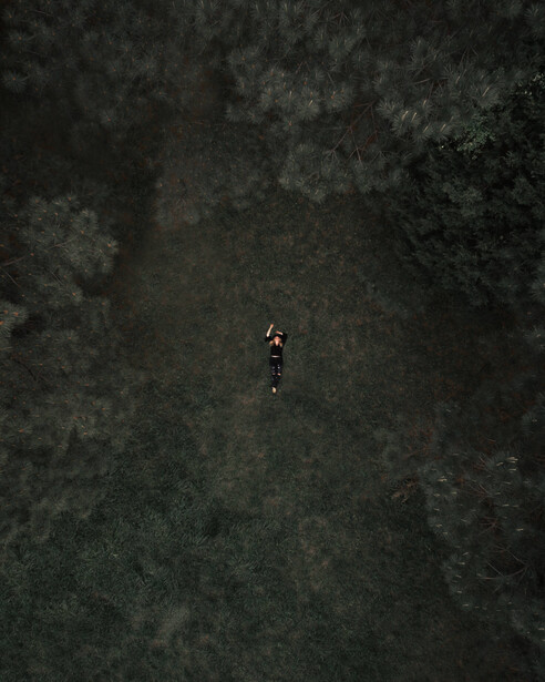 Girl laying in the grass 