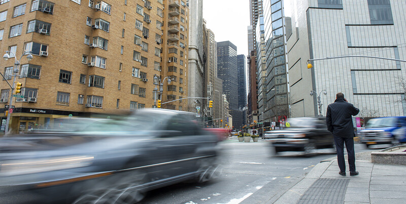 At 1/5 of a second, cars blur by Columbus Circle in New York City.