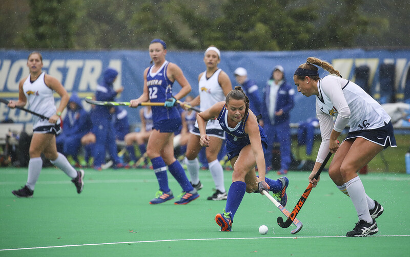 The Canon EF 100-400mm f/4.5-5.6 II can pretty much do it all. I've used it here for field hockey, but it's easily at home for large event work as well.