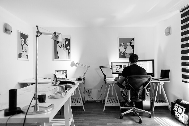 photographer working in office fighting creativity rut