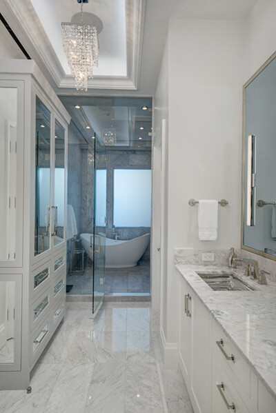 the "before" of a before and after interior composite photo of a bathroom
