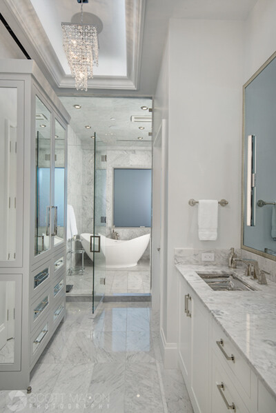 the finished photo of a before and after interior photo of a bathroom