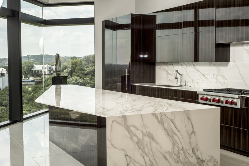 an interior behind-the-scenes photo showing the flash frame of a kitchen with glare on the countertop surface