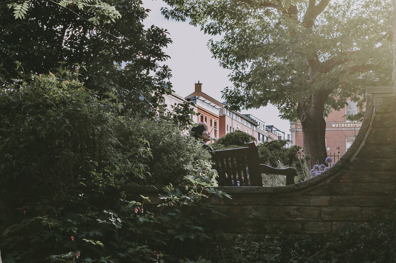 A business man relaxing in a city park