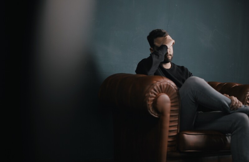 Man is stressed because of Instagram addiction