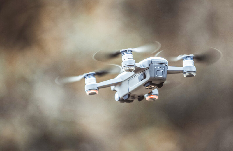 a photo of a drone mid-air in flight