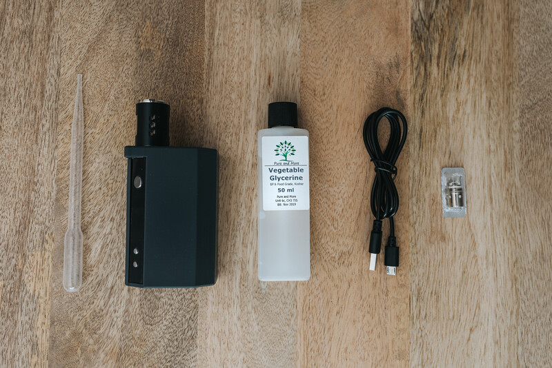 Small smoke machine and its contents on a table.