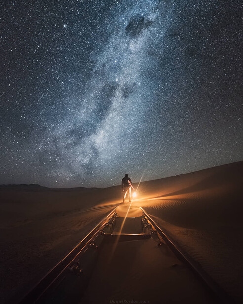 Abandoned railway and Milky Way in Kolmanskop