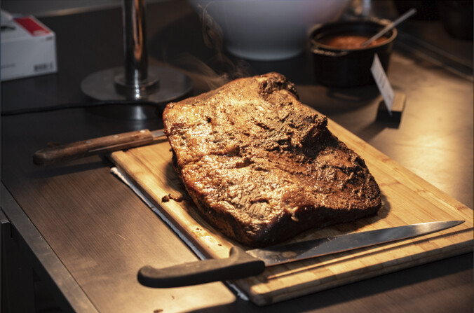 a brisket under a hotlight