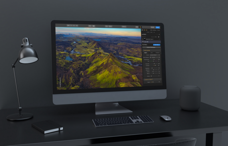A monitor and keyboard on a desk