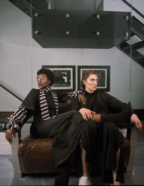 Two models posing for a fashion shoot