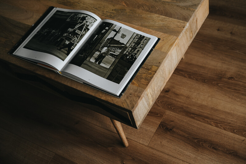 Photography book on a coffee table.