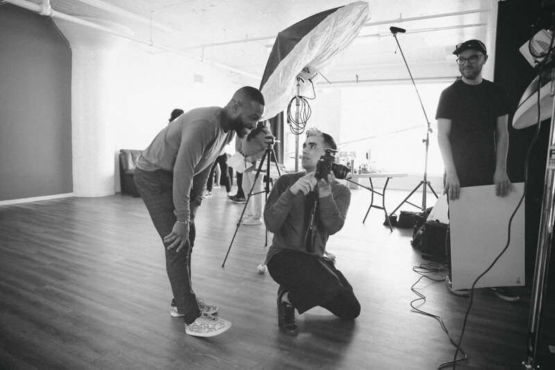 Discussing images with client on set