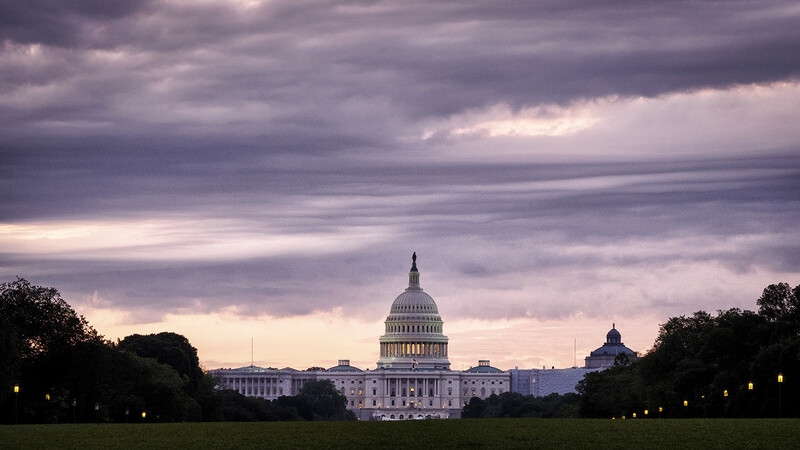 Using the curvature of the National Mall, I was able to obscure the stage for an at least OK shot of the Capitol Building at sunrise.