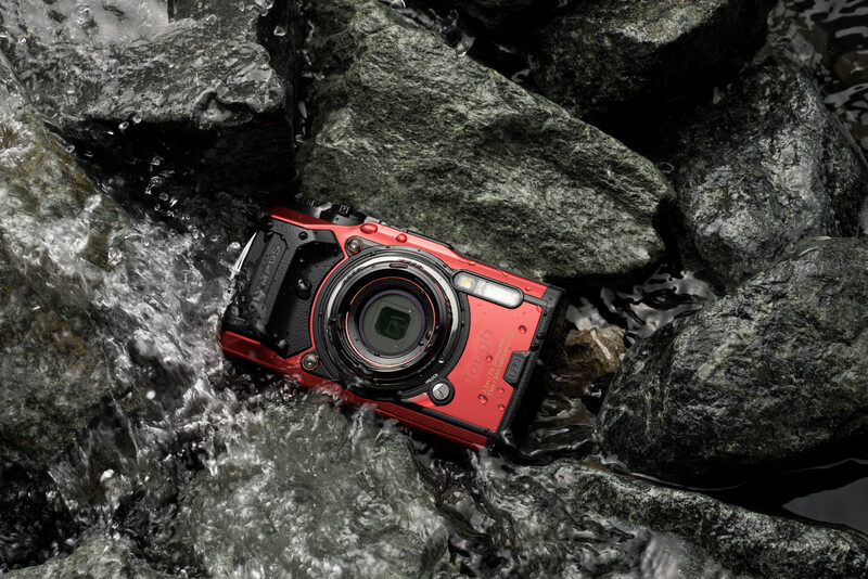 cover photo of the Olympus TG-6 on rocks with water