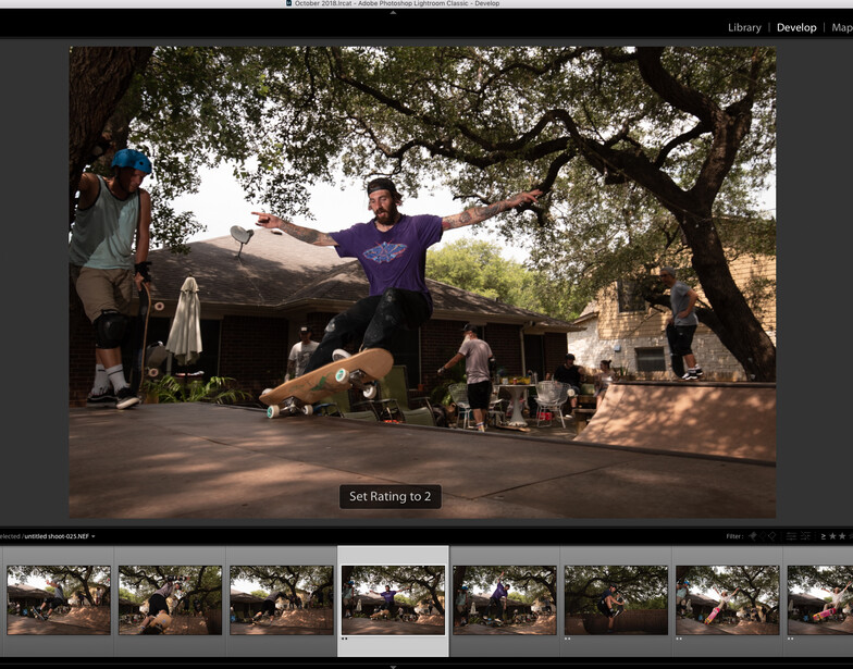 a screen capture of Lightroom showing a 2 star rating being selected