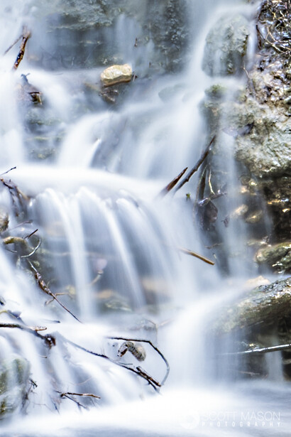 an image of a waterfall with silky water