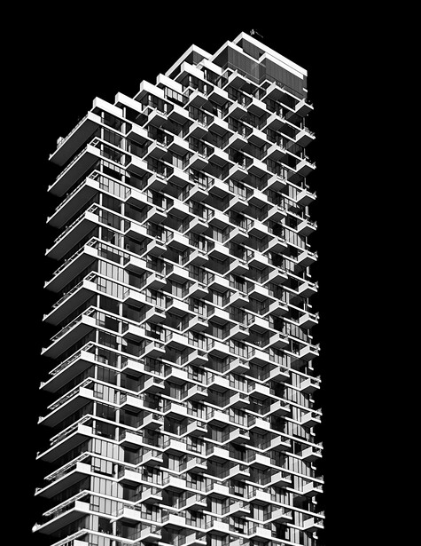black and white building, dark sky