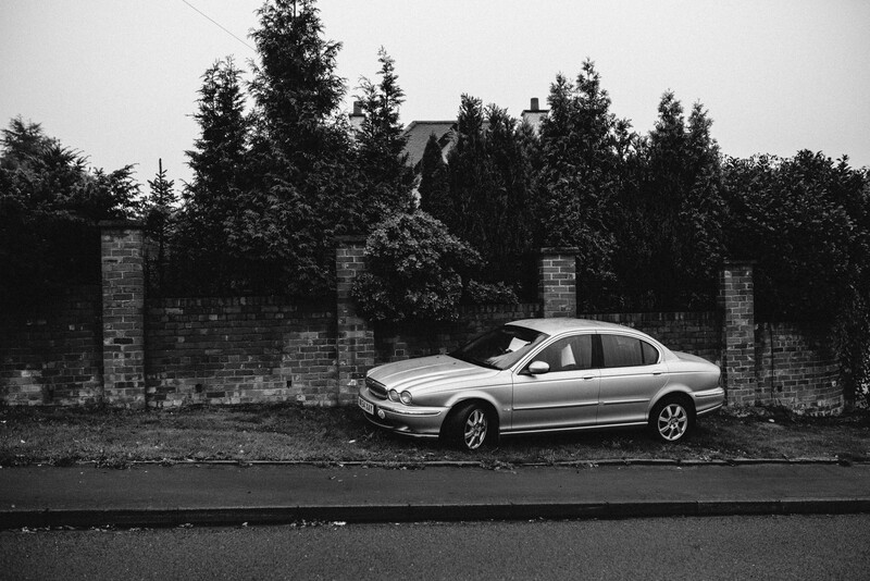 A used car for sale on a side of the road