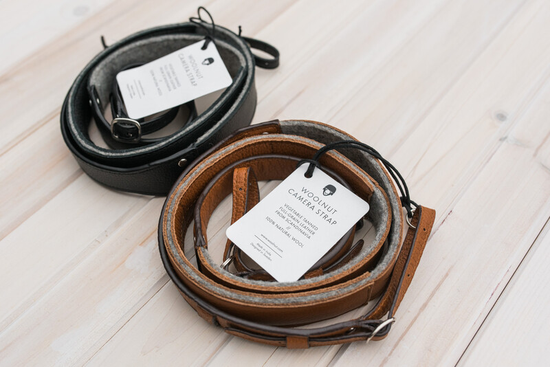 Black and brown leather camera strap